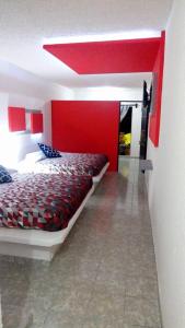 Postel nebo postele na pokoji v ubytování Hotel San Carlos Yautepec