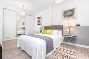 A bed or beds in a room at iloftmalaga Mártires