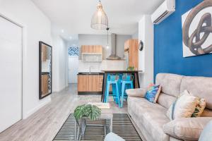 A kitchen or kitchenette at iloftmalaga Mártires