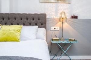 A bed or beds in a room at iloftmalaga Mártires