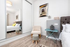 A bed or beds in a room at iloftmalaga Mártires