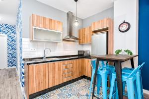 A kitchen or kitchenette at iloftmalaga Mártires