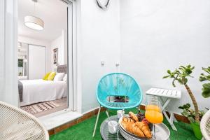 A bed or beds in a room at iloftmalaga Mártires