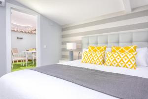 A bed or beds in a room at iloftmalaga Mártires