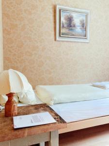 Postel nebo postele na pokoji v ubytování Hotel Gletscherblick