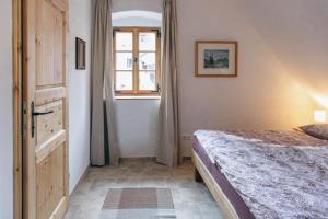 Llit o llits en una habitació de Appartements Adam-Mühle
