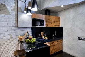 Una cocina o zona de cocina en Author Boutique Hotel (ex Golden Garden Boutique Hotel)