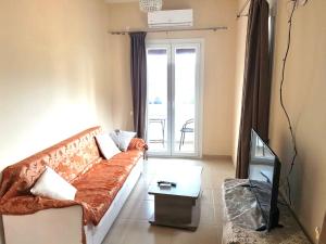 A television and/or entertainment centre at Votsalo Pool Apts