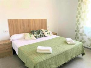 Postel nebo postele na pokoji v ubytování Roses Casc Antic SL Sant Elm 3 + 41 fotografií