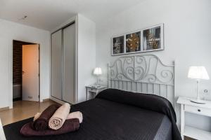 A bed or beds in a room at Faro de Garrucha