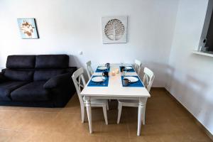 A seating area at Faro de Garrucha
