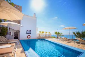 Bazén v ubytování Hotel Servigroup Montíboli nebo v jeho okolí