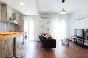 Televízia a/alebo spoločenská miestnosť v ubytovaní NEW Apartamento Tierra Andaluza junto Mezquita