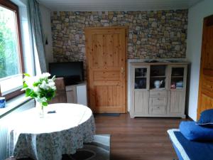 Posezení v ubytování Ferienwohnung Fiebelkorn Vogt in Kappeln