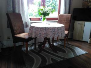 Posezení v ubytování Ferienwohnung Fiebelkorn Vogt in Kappeln