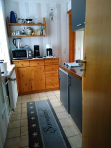 Kuchyň nebo kuchyňský kout v ubytování Ferienwohnung Fiebelkorn Vogt in Kappeln