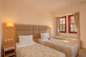 Postel nebo postele na pokoji v ubytování Alize Hotel Oludeniz - All Inclusive