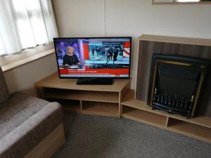 TV a/nebo společenská místnost v ubytování 707 Seawick