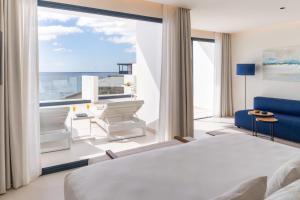 Royal Marina Suites Boutique Hotel - Adults Only客房内的一张或多张床位