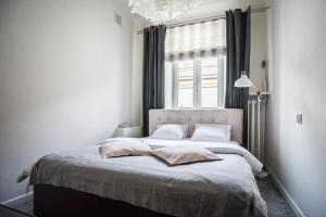 Posteľ alebo postele v izbe v ubytovaní Old Town Heart IV - Krakowskie Przedmieście