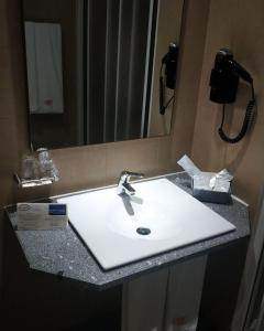 Koupelna v ubytování Hotel Comodoro