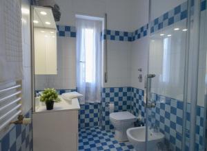 Ett badrum på Milanoverse Apartment
