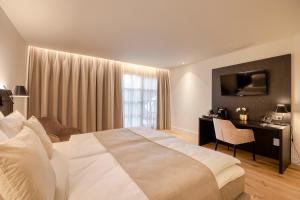 Ένα ή περισσότερα κρεβάτια σε δωμάτιο στο Corsendonk Hooge Heyde
