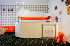 Postel nebo postele na pokoji v ubytování LH Vintage Design Hotel Sax