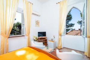 Et tv og/eller underholdning på House Boninovo + 37 billeder