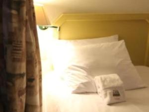 Postel nebo postele na pokoji v ubytování Plaza Mayor Hotel
