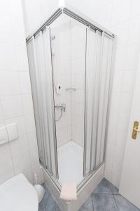 Koupelna v ubytování Hotel Garni Am Deich