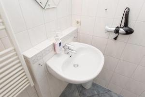 Koupelna v ubytování Hotel Garni Am Deich