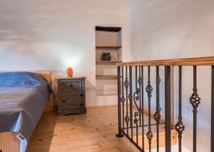 Postel nebo postele na pokoji v ubytování Holiday House Antica for 6 persons green surroundings of the island of Cres