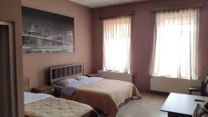 Una cama o camas en una habitación de Ideal