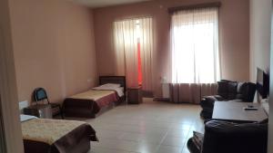 Una cama o camas en una habitación de Ideal