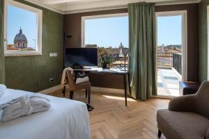 TV a/nebo společenská místnost v ubytování Hotel Damaso
