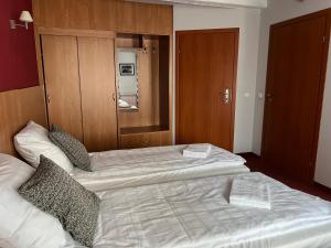 Posteľ alebo postele v izbe v ubytovaní Garbarska 22 Aparthotel
