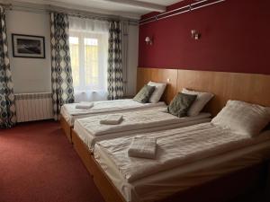 Posteľ alebo postele v izbe v ubytovaní Garbarska 22 Aparthotel