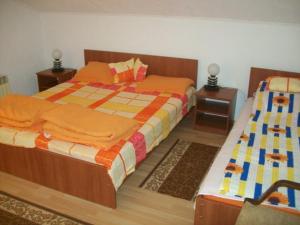Postel nebo postele na pokoji v ubytování Villa Kliment Pestani