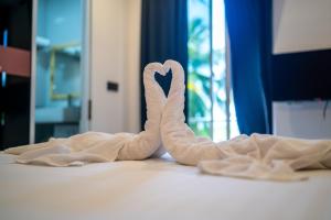 Postel nebo postele na pokoji v ubytování Merijaan Maldives