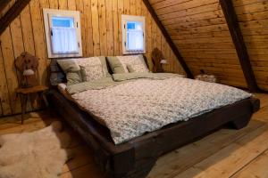 Postel nebo postele na pokoji v ubytování Perníkovka
