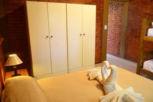 Una cama o camas en una habitación de Sesma Excelencia en Cabañas