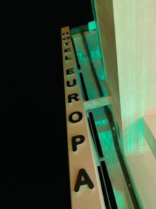 a sign with the word education on the side of a shelf at EUROPA Hotel in Vasto