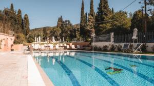 The swimming pool at or close to Dominoes Corfu