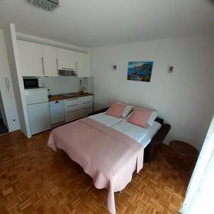 Kuchyň nebo kuchyňský kout v ubytování Apartmani Kramar + 22 fotografií