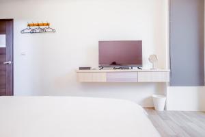 Μια τηλεόραση ή/και κέντρο ψυχαγωγίας στο WOW Penghu Homestay