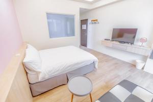 Μια τηλεόραση ή/και κέντρο ψυχαγωγίας στο WOW Penghu Homestay