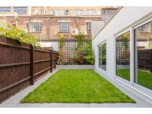 Foto da galeria de Pass the Keys - King's Cross modern flat with Sunny Garden em Londres