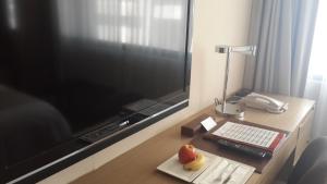 TV a/nebo společenská místnost v ubytování Kaohsiung Chateau de Chine Hotel