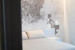 Ένα ή περισσότερα κρεβάτια σε δωμάτιο στο Fronte Etna